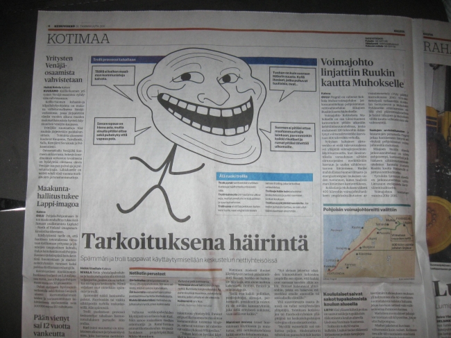 Trollface in the newspaper